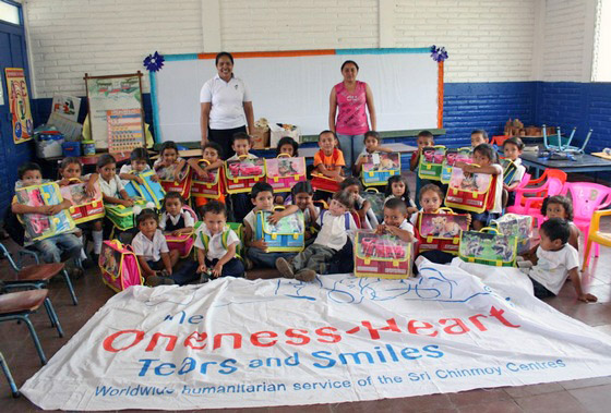 Children receiving toys as part of the "Kids to Kids Programme"