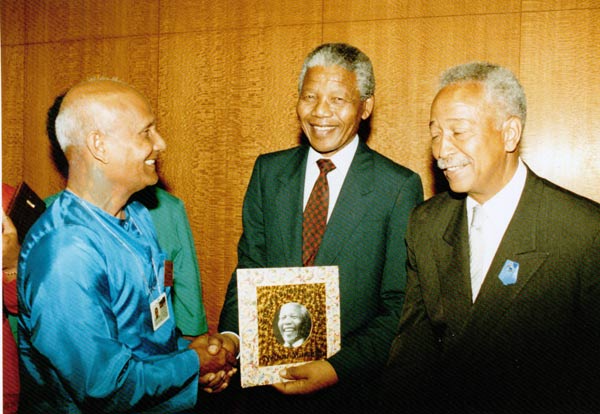 Sri Chinmoy and Nelson Mandela, United Nations – June 1990 (with New York Mayor, David Dinkins, on the right.