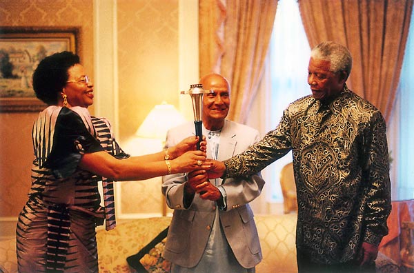 Mama Graça Machel, Sri Chinmoy and President Nelson Mandela with the Peace Torch, 1998.
